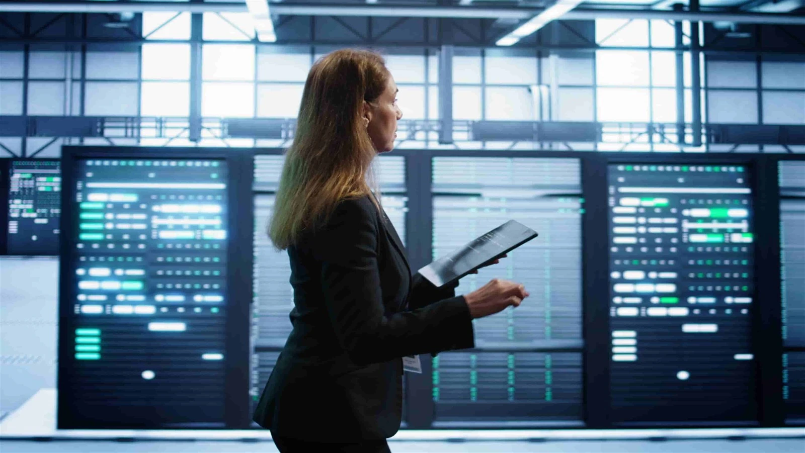 woman-data-center-making-sure-rigs-are-functioning-optimallycompressed